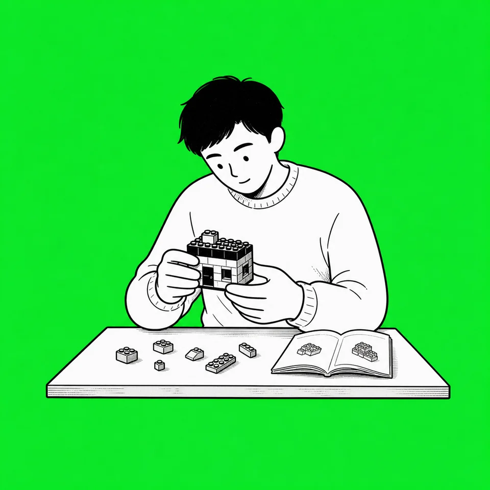 Building bricks and a built set on a shelf — Hoblio's brick shelf